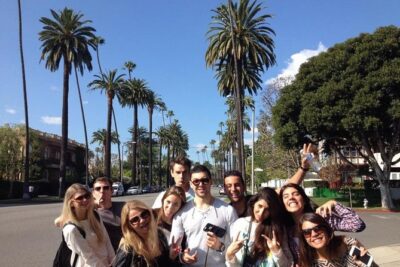 L.A. Highlights Private Full Day Tour of Los Angeles - Venice Beach Boardwalk: street life, Muscle Beach, and canal views
