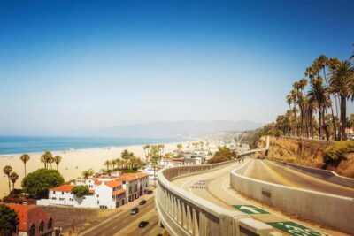 Malibu: Coastal Gems Scenic Driving Tour with Audio Guide - Starting at the edge of Santa Monica: Pacific Coast Highway in motion